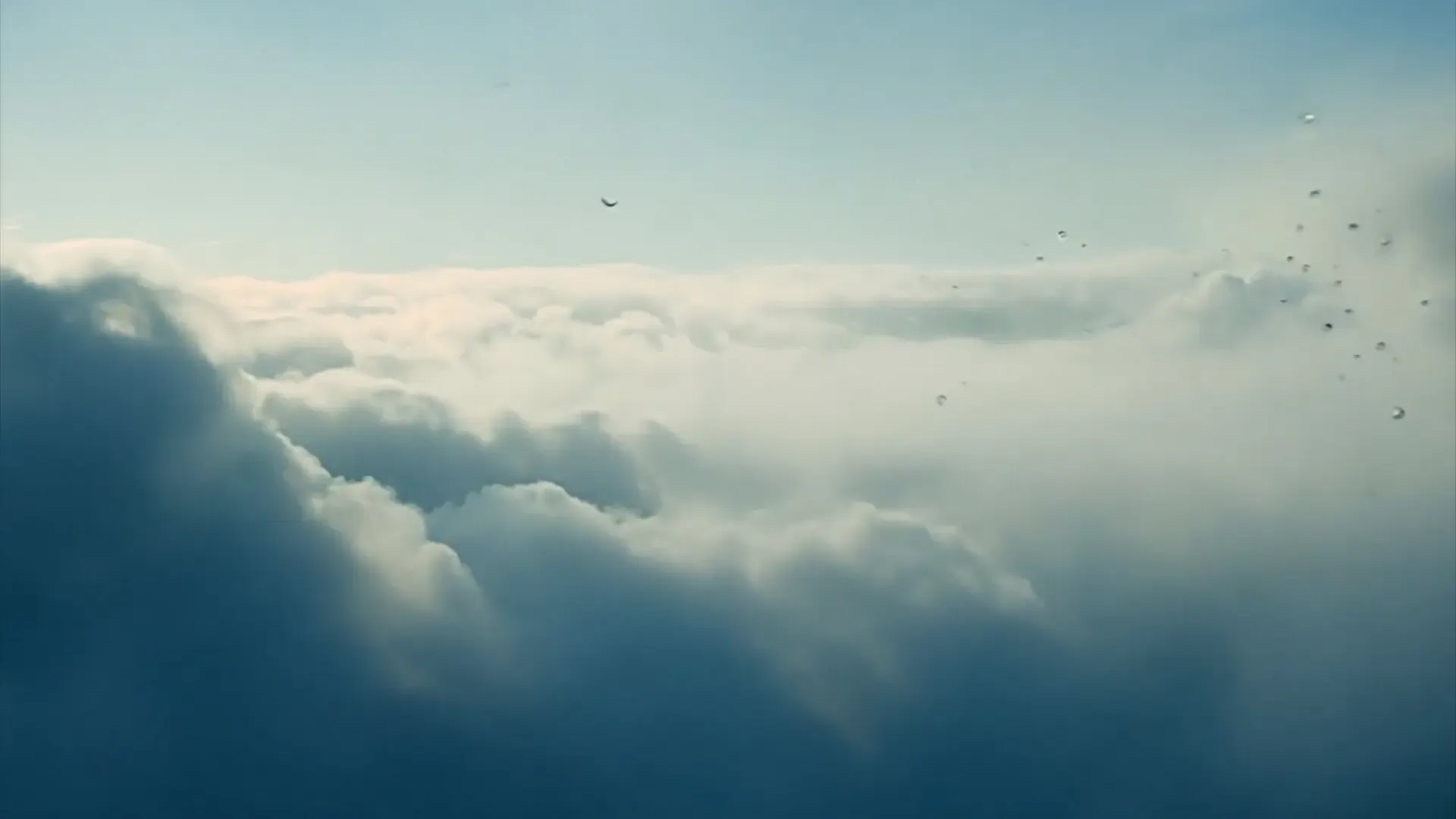 Clouds and Raindrops Atmospheric Background for Documentary Films